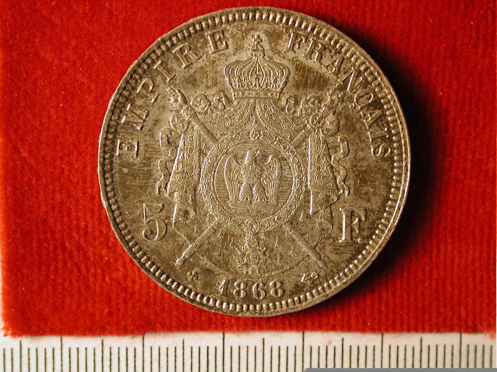 Avers du 5 francs Napoléon III tête laurée 1868 : profil impérial couronné de lauriers, atelier de Paris.