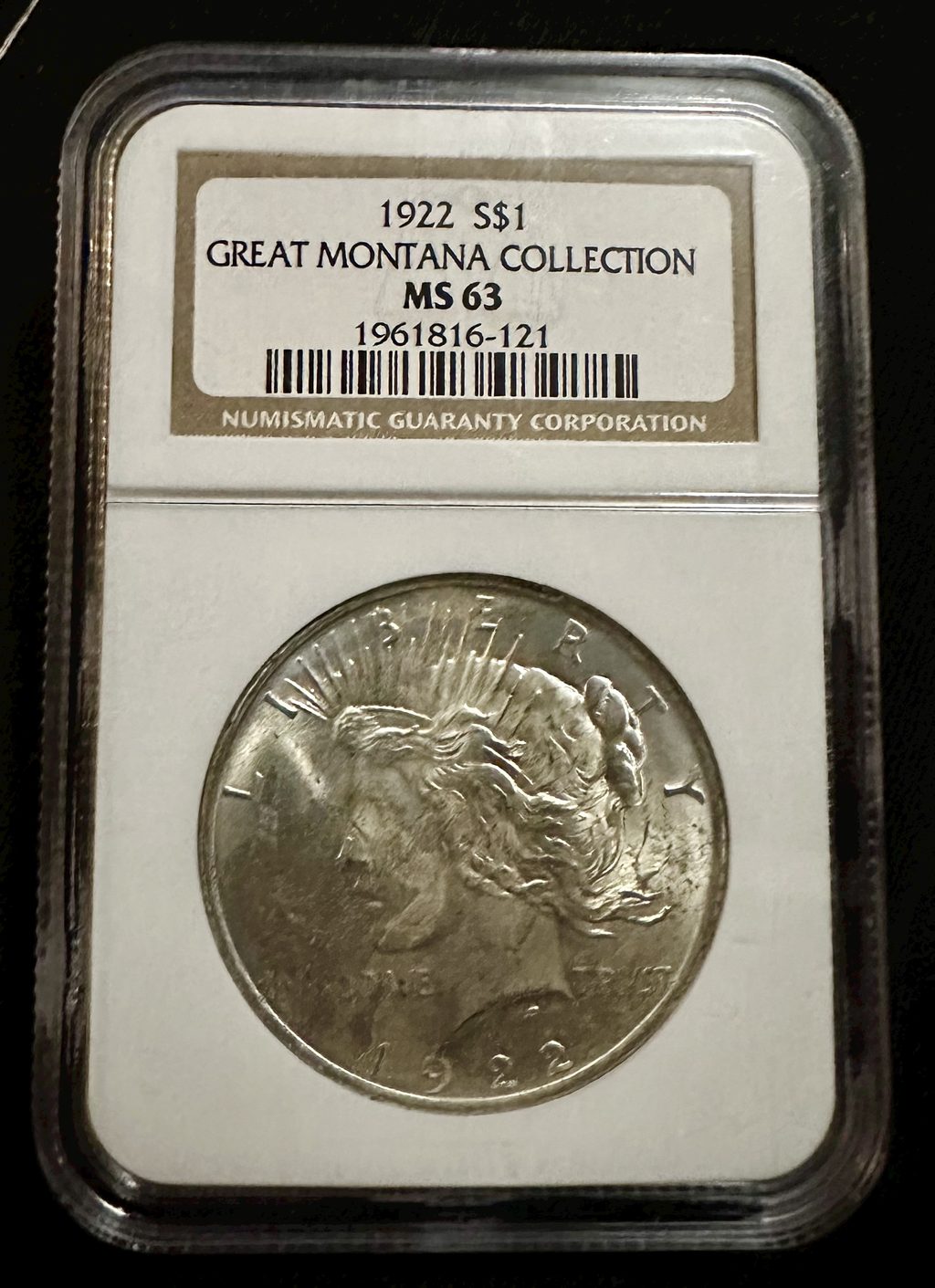 Avers du Peace Dollar 1922 : profil de Liberty rayonnant, dessin d'Anthony de Francisci.